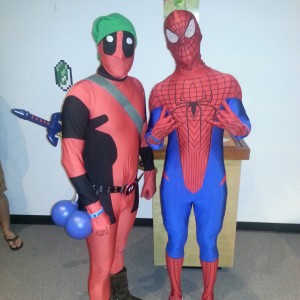 Deadpool dressed as Link and Spiderman.
